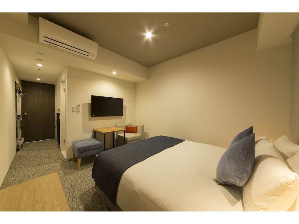 コンフォートダブルルーム(クイーンベッド1台)2名利用 禁煙 客室1 | 東急ステイ高輪 (泉岳寺駅前)