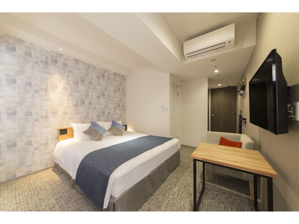 レジデンシャルダブルルーム(クイーンベッド1台)2名利用 禁煙 客室3 | 東急ステイ高輪 (泉岳寺駅前)