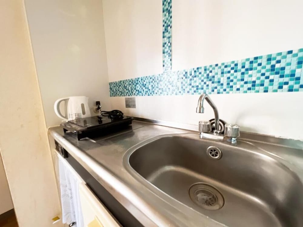 アパートメント 1 ベッドルーム (301) 専用キッチン0 | PINE TREE HOTEL