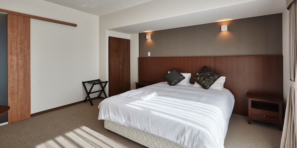 (コンドミニアムタイプ) ダブルルーム 客室1 | クリアスホテル壺川マルシェ