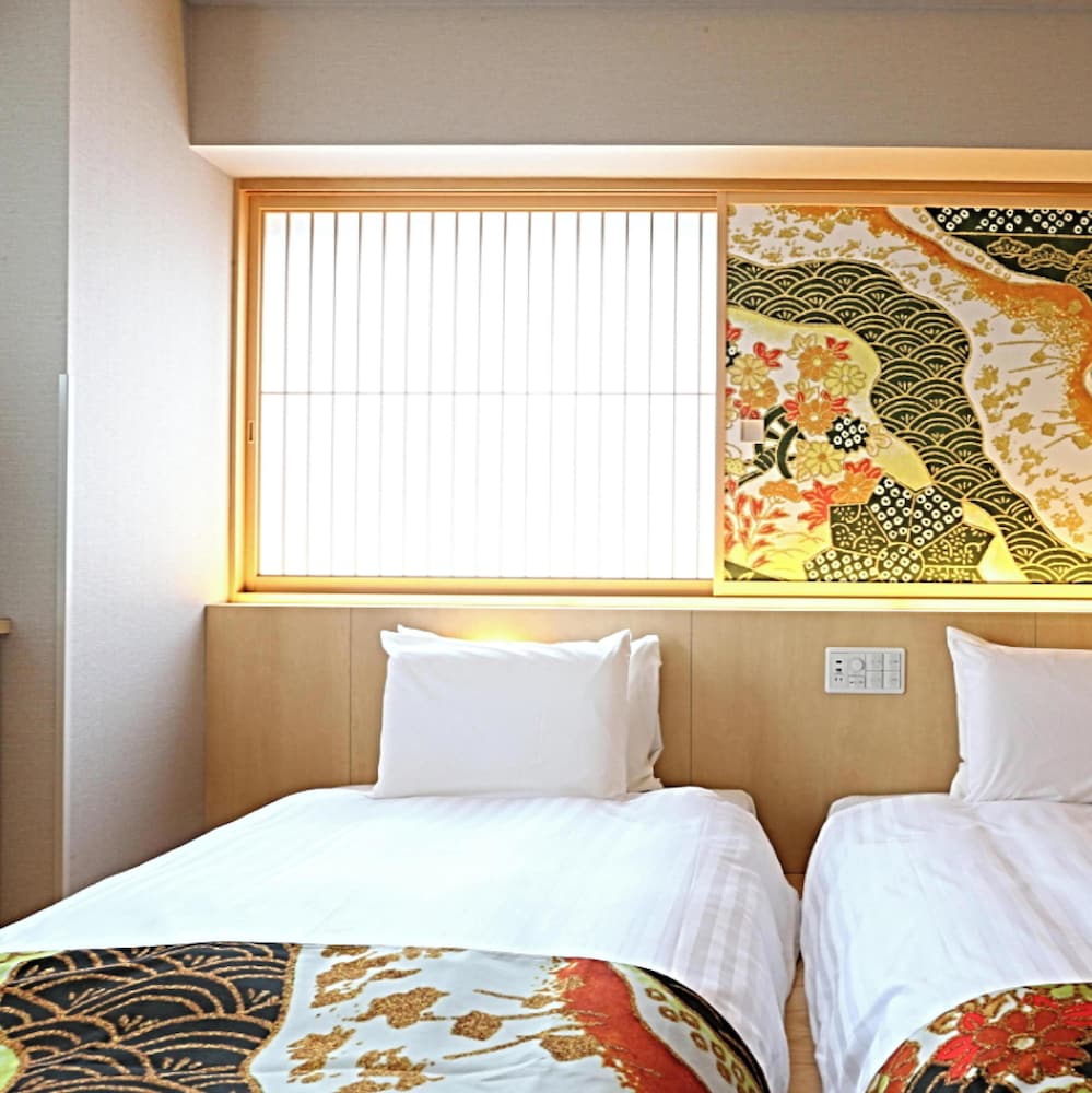 和洋室ツイン [20sqm 低床ベッド110cm/2台] 客室2 | ホテルウィングインターナショナルプレミアム金沢駅前