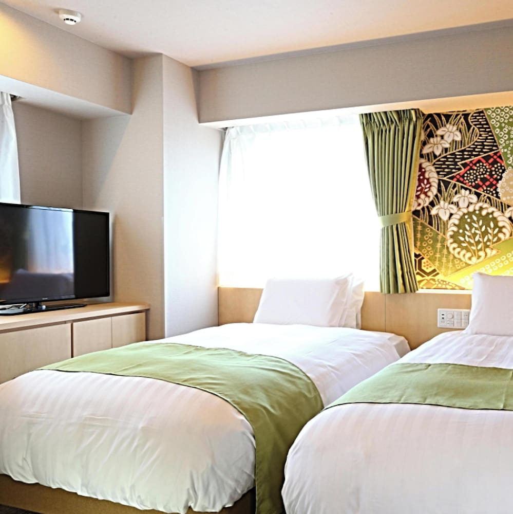 ツイン [20sqm ベッド幅110cm/2台] 客室1 | ホテルウィングインターナショナルプレミアム金沢駅前