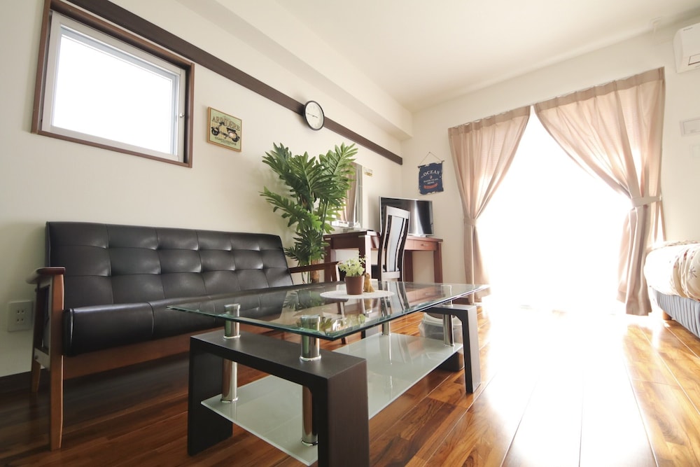 客室1 | 美らガーナハウス壺川 那覇