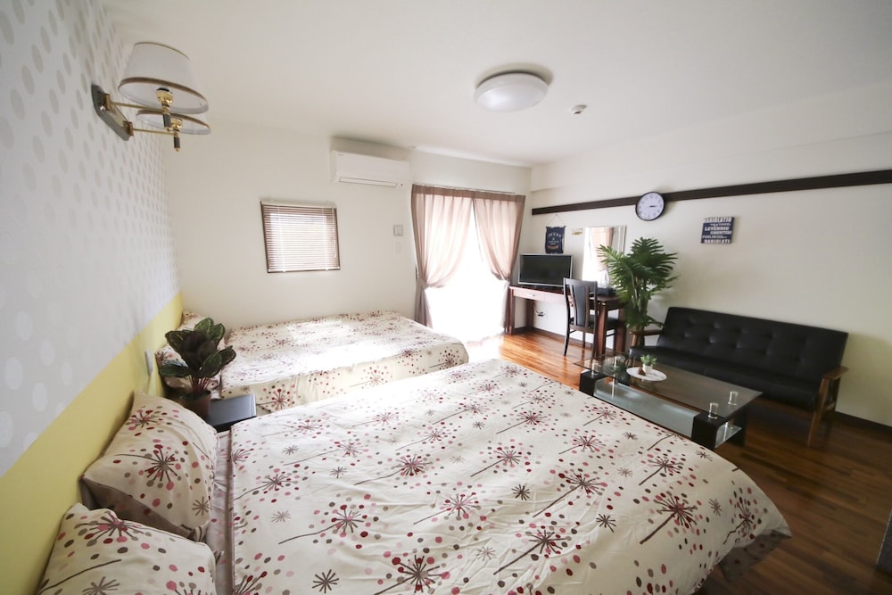 4 人部屋 客室19 | 美らガーナハウス壺川 那覇