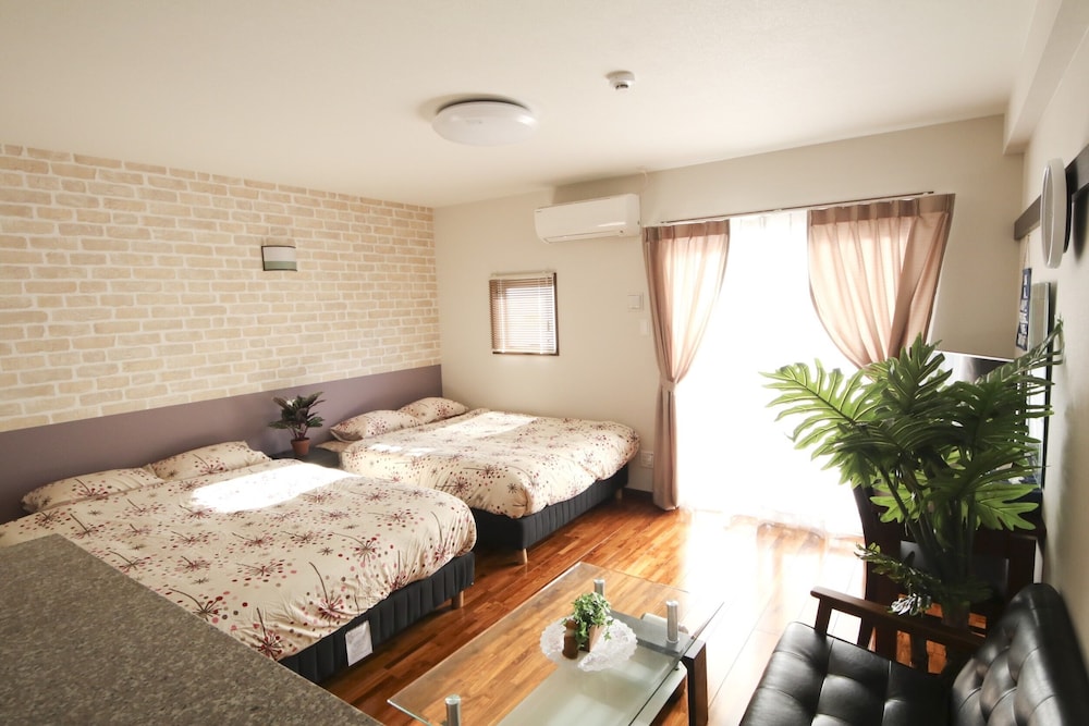 4 人部屋 客室25 | 美らガーナハウス壺川 那覇