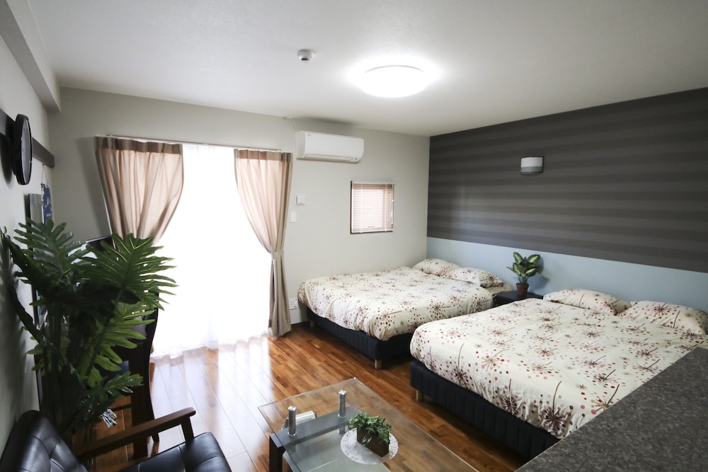 4 人部屋 客室42 | 美らガーナハウス壺川 那覇