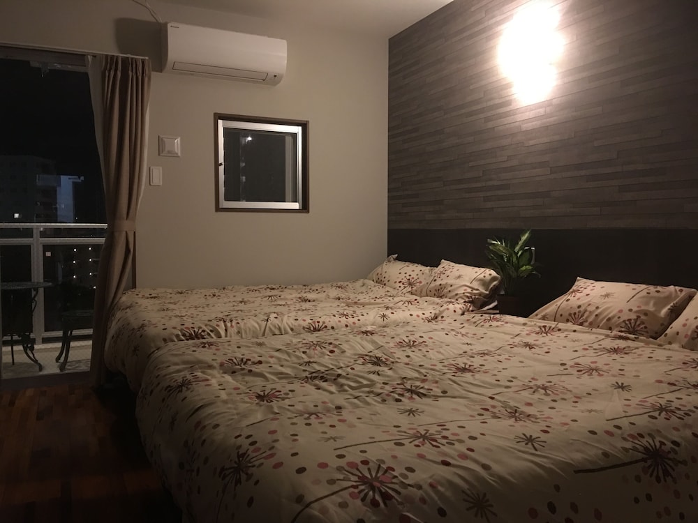 4 人部屋 客室12 | 美らガーナハウス壺川 那覇