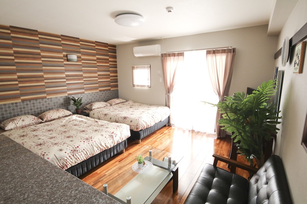 4 人部屋 客室21 | 美らガーナハウス壺川 那覇