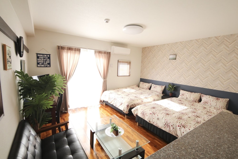 4 人部屋 客室26 | 美らガーナハウス壺川 那覇