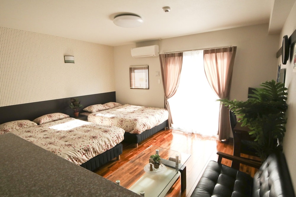 4 人部屋 客室27 | 美らガーナハウス壺川 那覇