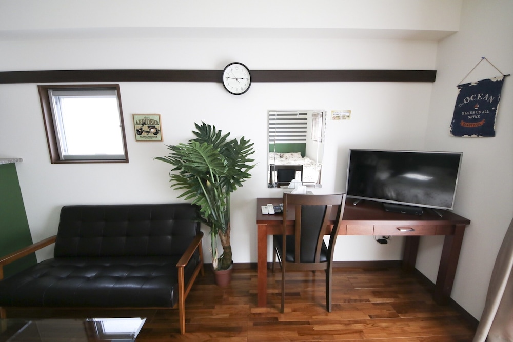 4 人部屋 客室7 | 美らガーナハウス壺川 那覇