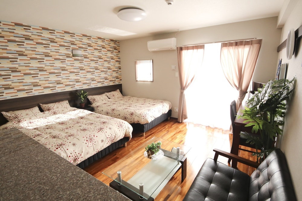 4 人部屋 客室15 | 美らガーナハウス壺川 那覇