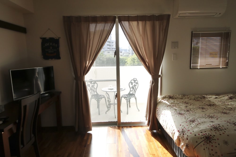 4 人部屋 客室2 | 美らガーナハウス壺川 那覇