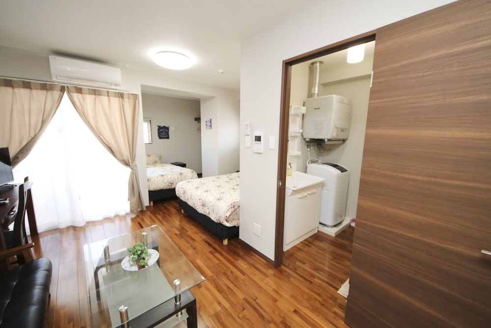 4 人部屋 客室32 | 美らガーナハウス壺川 那覇