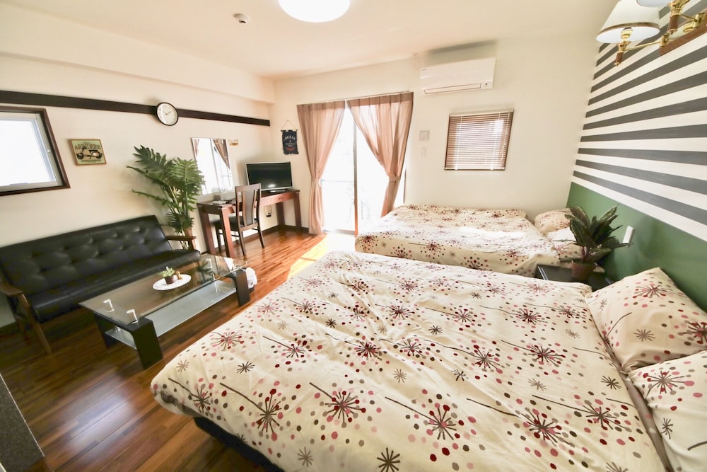 4 人部屋 客室16 | 美らガーナハウス壺川 那覇