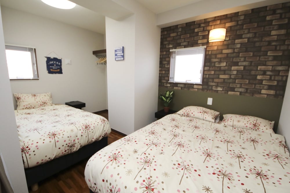 4 人部屋 客室28 | 美らガーナハウス壺川 那覇