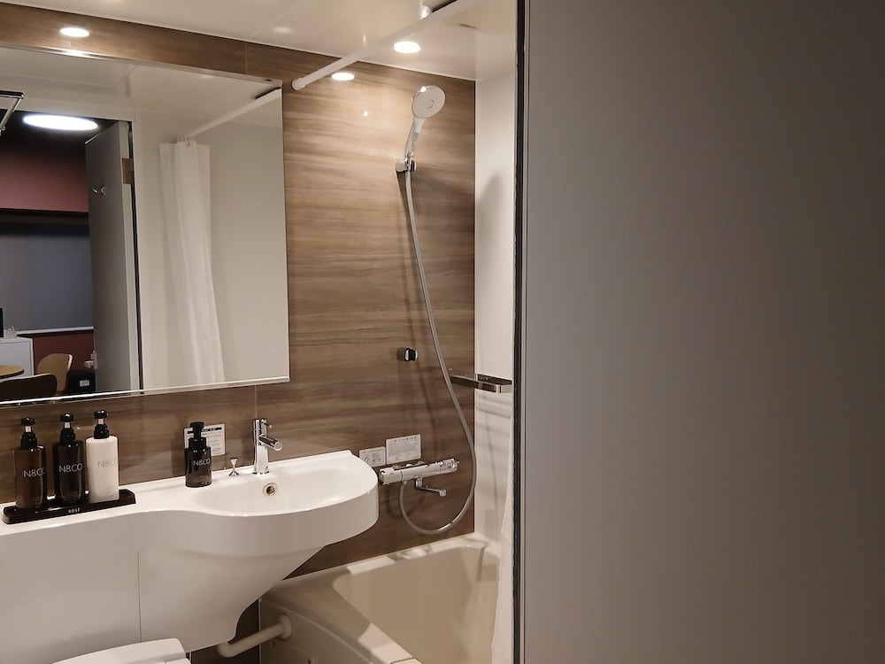 和洋室 60平米 ダブルベッド 禁煙 バスルーム0 | 国際タウンズイン