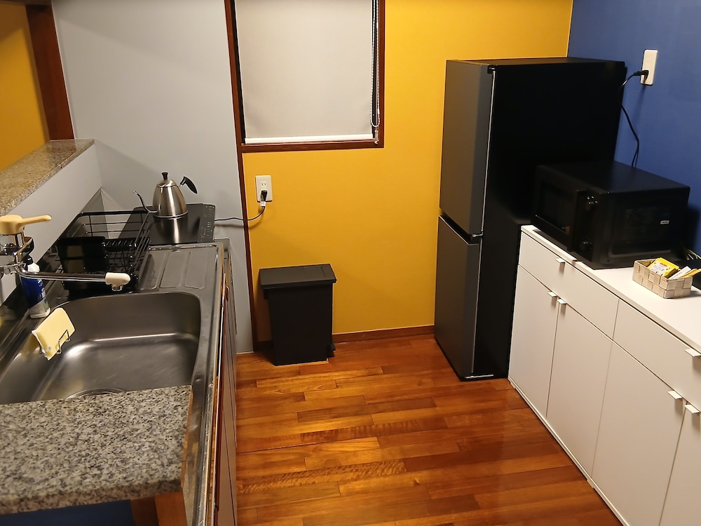 和洋室 60平米 ダブルベッド 禁煙 専用キッチン0 | 国際タウンズイン