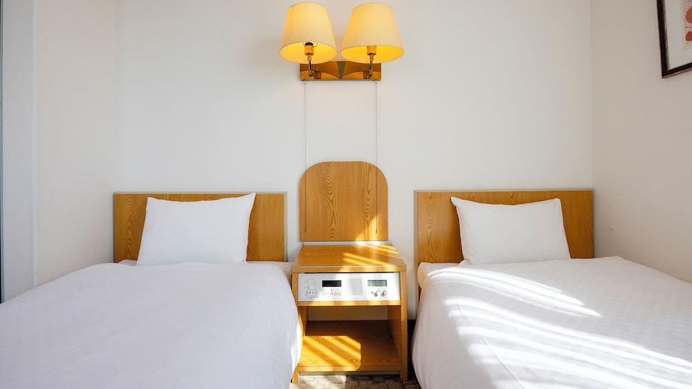 ツインルーム 喫煙可 客室1 | ホテル明治屋