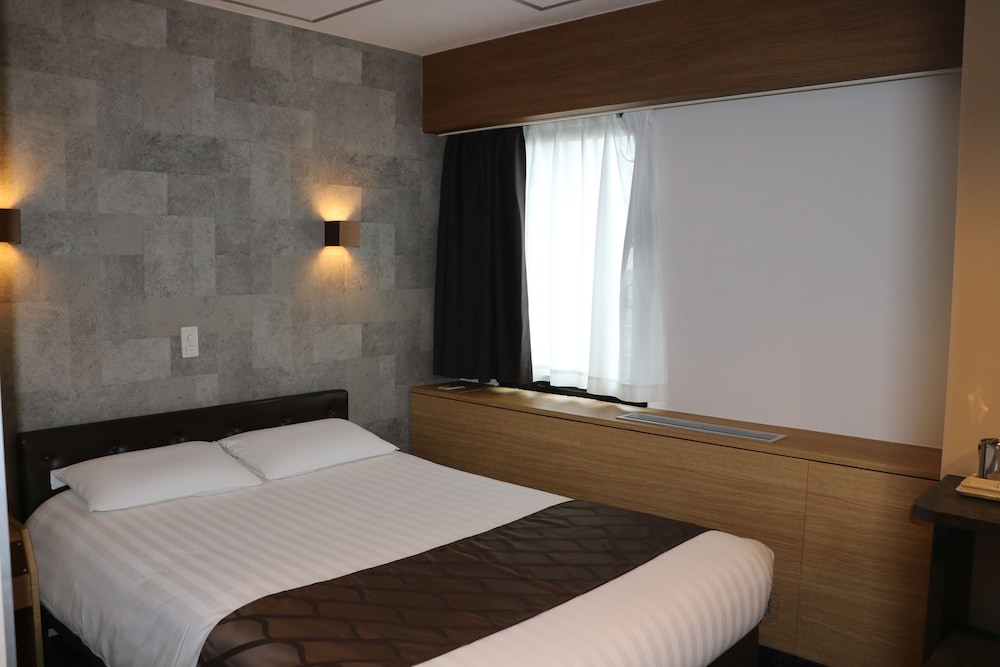 喫煙ダブルルーム D6 トレインビュー | ホテル サン シティ池袋