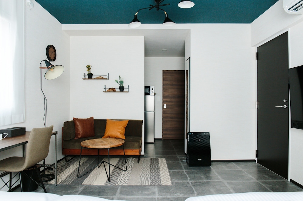 デラックス ツインルーム 簡易キッチン リビング エリア4 | ホテル ポットマム