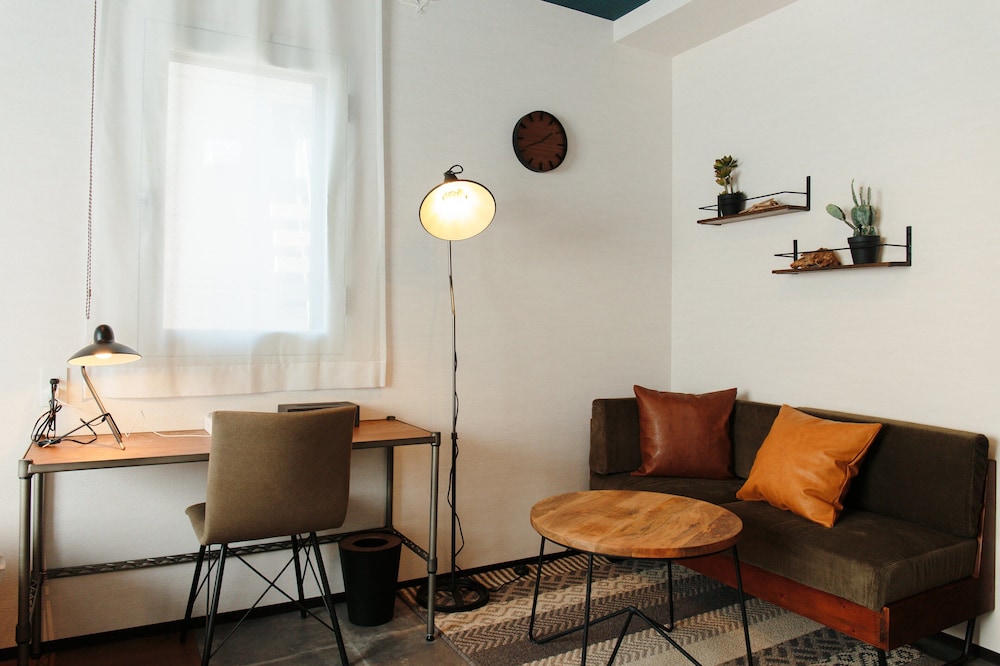 デラックス ツインルーム 簡易キッチン リビング エリア2 | ホテル ポットマム