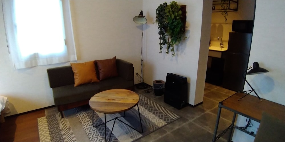 デラックス ツインルーム 簡易キッチン リビング エリア1 | ホテル ポットマム