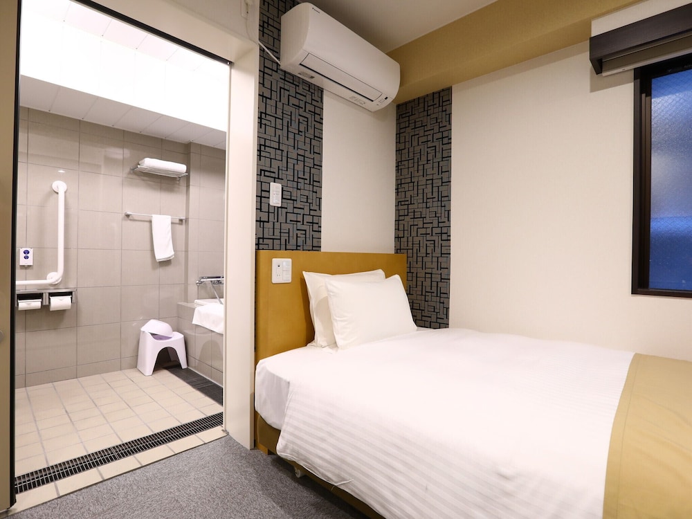 [全室禁煙]ユニバーサルルーム 17sqm ベッド幅120cm 客室1 | KOKO HOTEL 上野駅前
