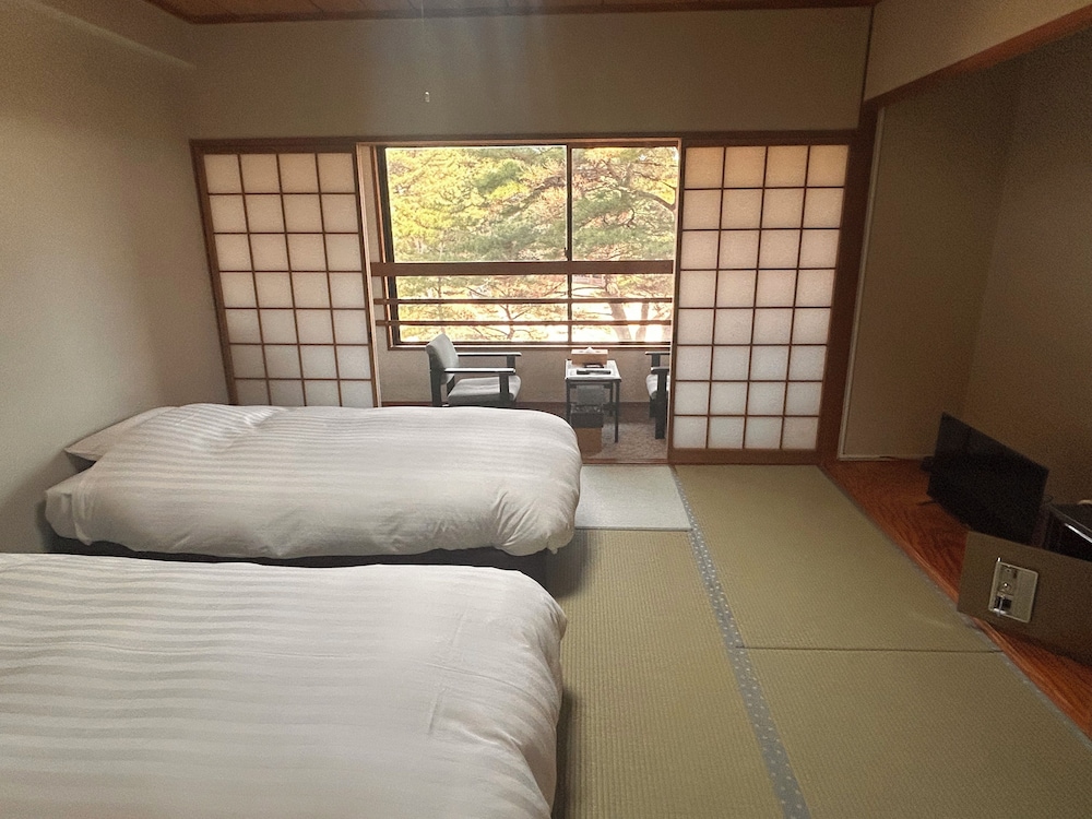 和ベッド8畳 禁煙 (バスなし) 客室1 | 阿蘇 梅園 SPA RESORT