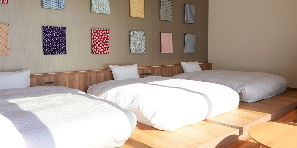 プレミアム トリプルルーム シングルベッド 3 台 専用バスルーム 別館 客室1 | 白馬龍神温泉 RYOKAN SUI