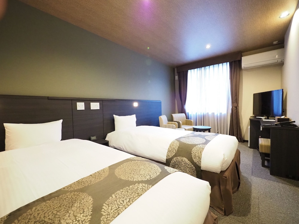 デラックス ツインルーム シングルベッド 2 台 禁煙 | たびのホテル飛騨高山