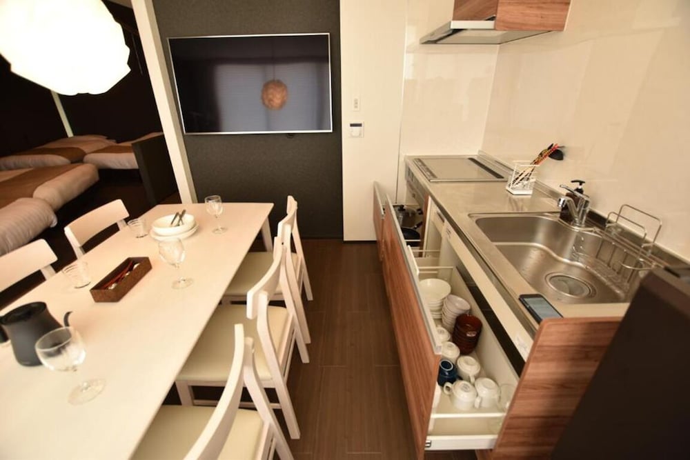 エグゼクティブ スタジオスイート ベッド (複数台) 禁煙 スパ浴槽 リビング エリア2 | ランドーレジデンス東京スイーツ