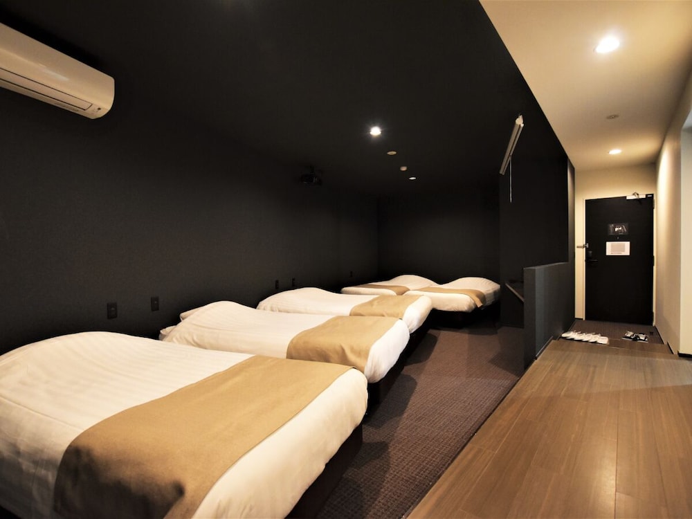 エグゼクティブ スタジオスイート ベッド (複数台) 禁煙 スパ浴槽 | ランドーレジデンス東京スイーツ