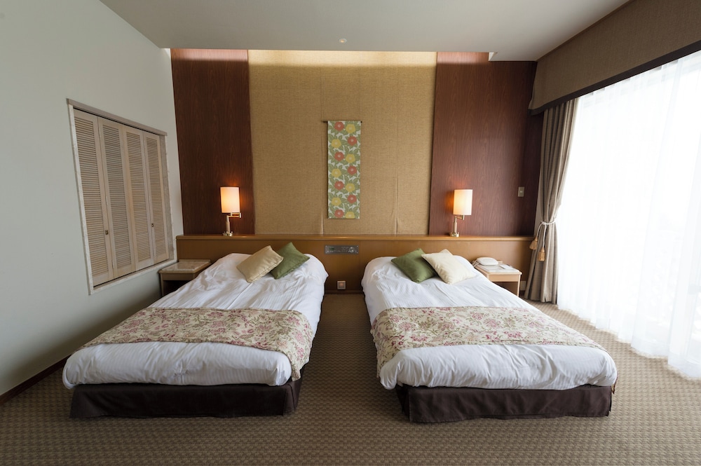 ツインルーム オーシャンビュー バルコニー 上層階 客室1 | ザ・サザンリンクス リゾート