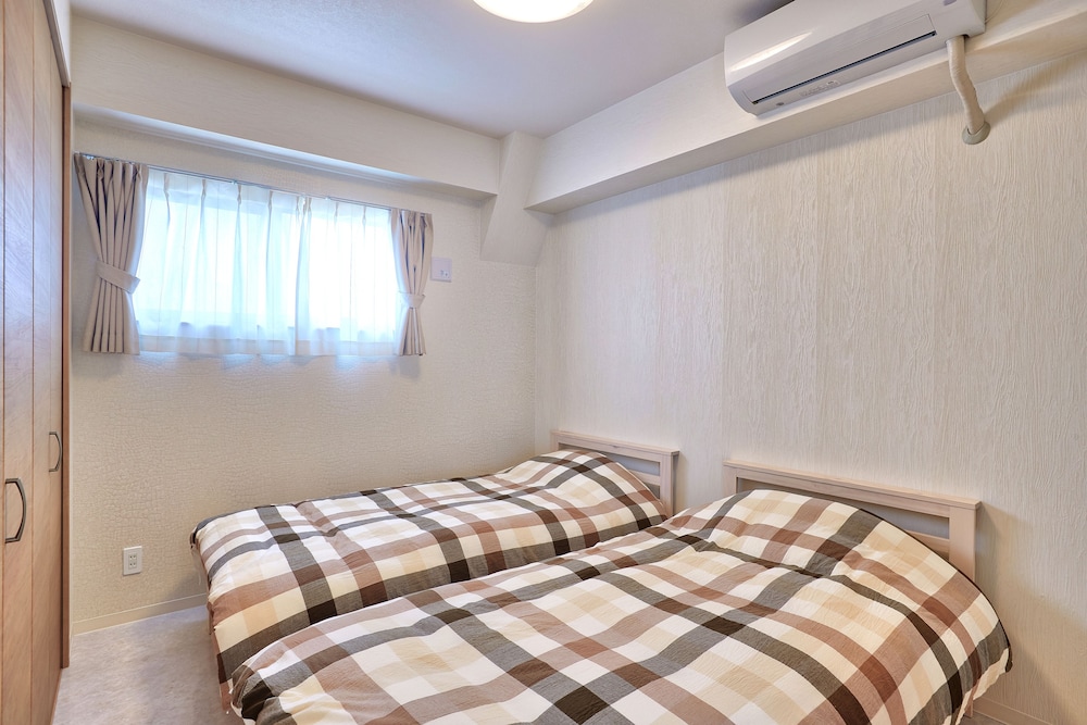 ファミリー ルーム 3 ベッドルーム 客室2 | マンゴーリゾート沖縄北谷