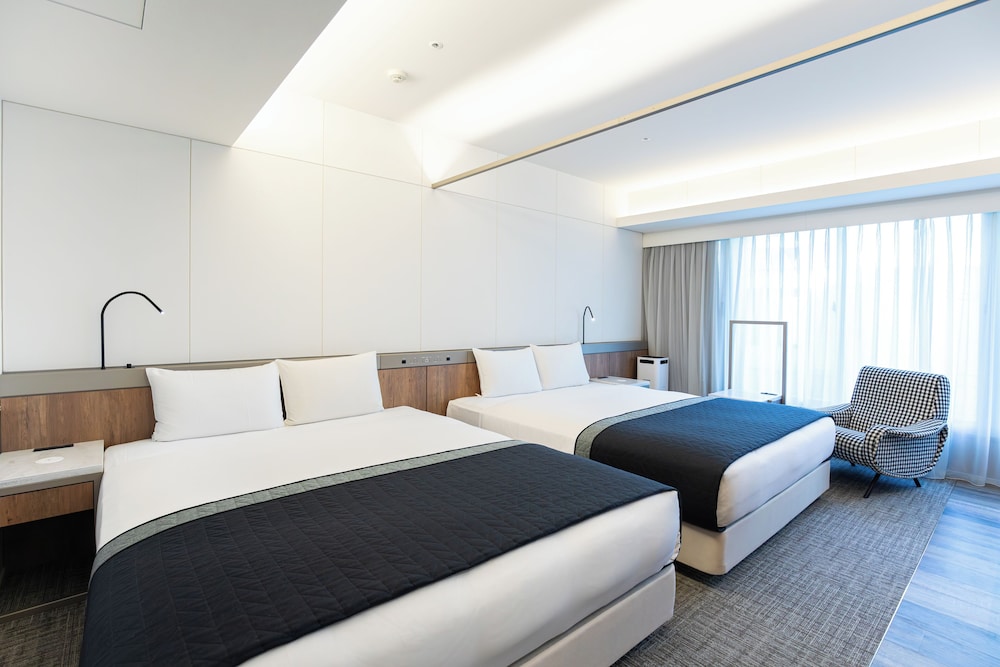 デラックス ツインルーム ダブルベッド 2 台 禁煙 | ホテルザフラッグ心斎橋