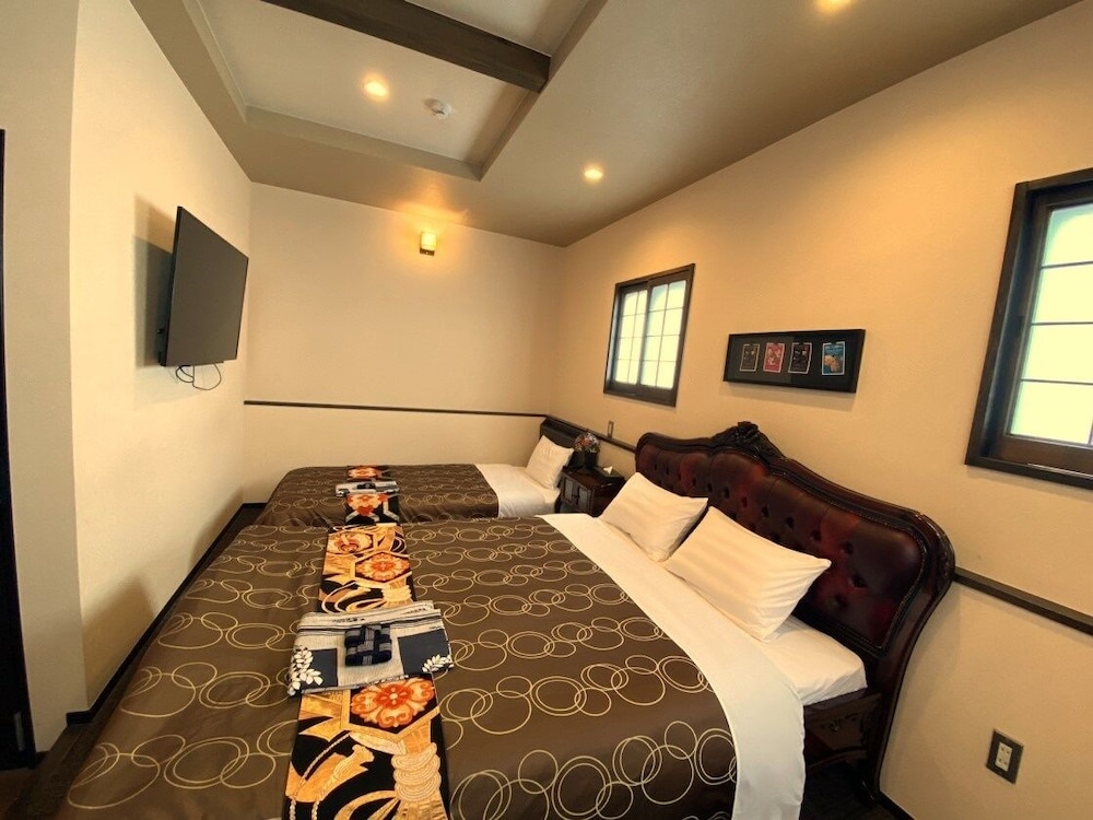 デラックス ツインルーム 新館TR20 ※ベジタリアンの食事変更はできません 客室4 | 和モダンな温泉旅館 湯布院らんぷの宿