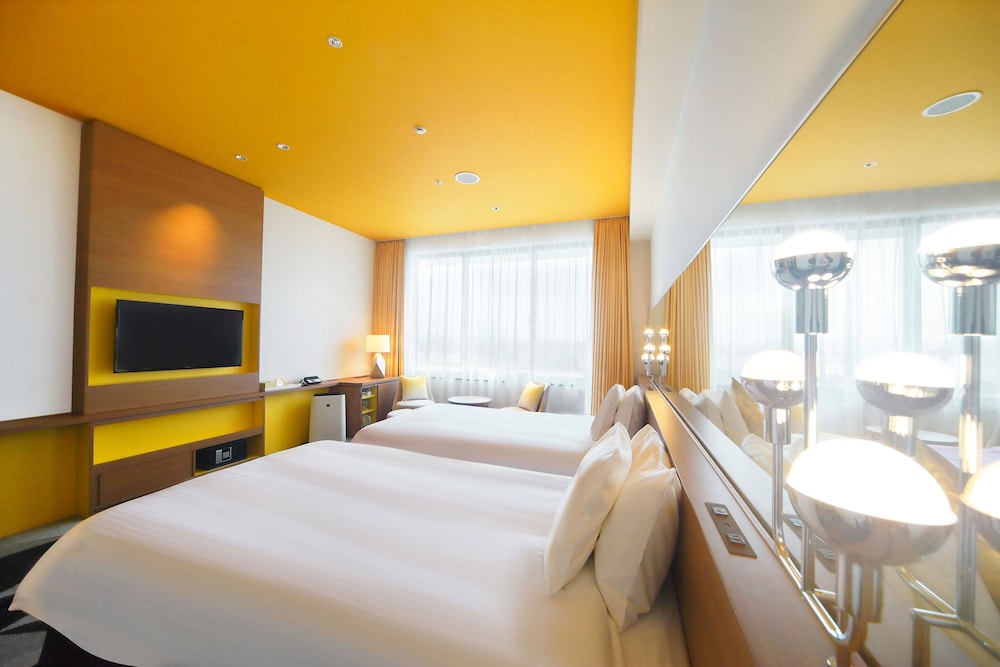 デラックス ツインルーム シングルベッド 2 台 禁煙 客室1 | ホテル ユニバーサル ポート ヴィータ