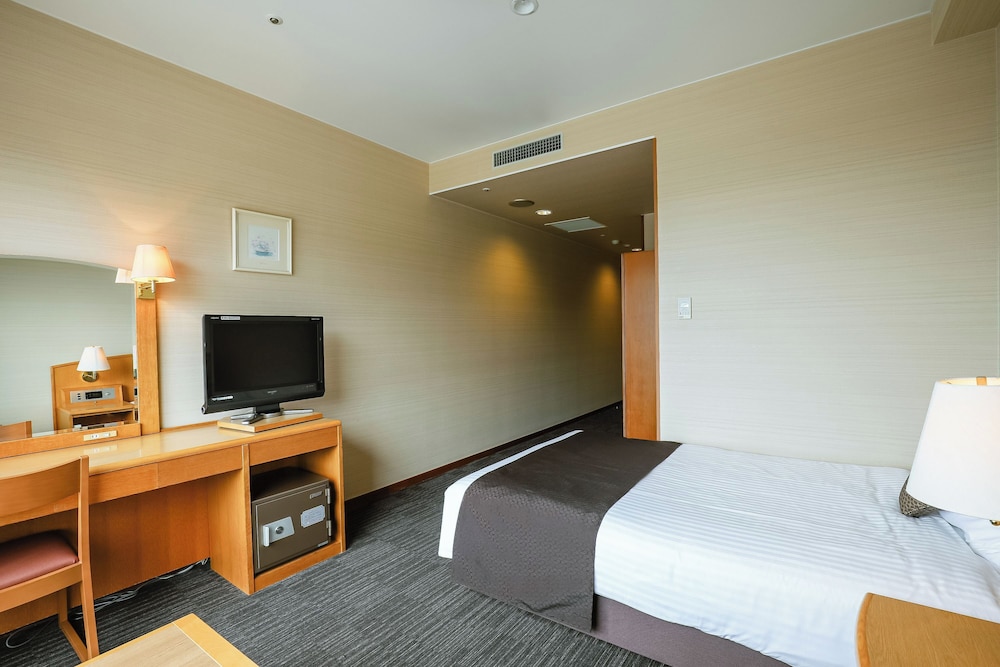 セミダブルルーム（バス付）禁煙 客室1 | 亀の井ホテル 高知