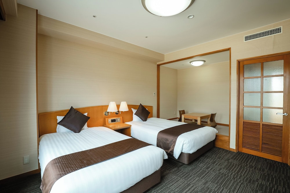 スーペリアツインルーム（バス付）禁煙 客室2 | 亀の井ホテル 高知