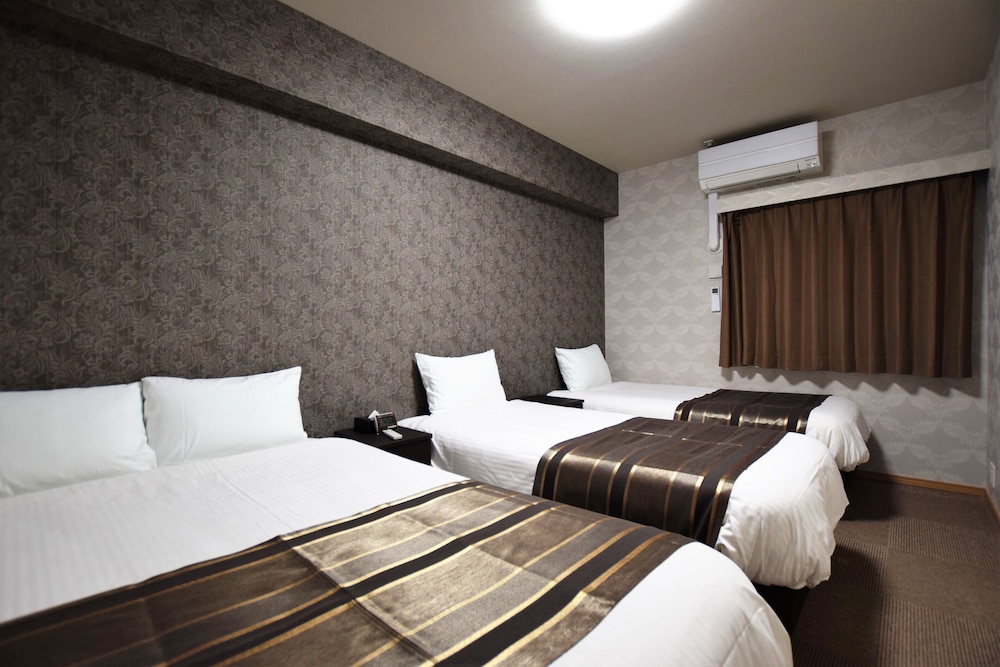 デザイン スイート 1 ベッドルーム 禁煙 リバービュー 客室2 | ランドーホテル福岡