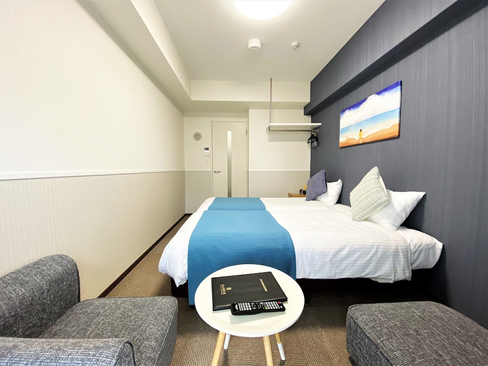 ロマンティック ツインルーム シングルベッド 2 台 禁煙 リバービュー 客室2 | ランドーホテル福岡