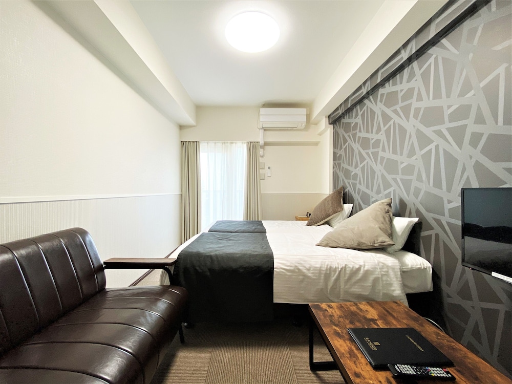 コンフォート ツインルーム シングルベッド 2 台 禁煙 リバービュー 客室3 | ランドーホテル福岡