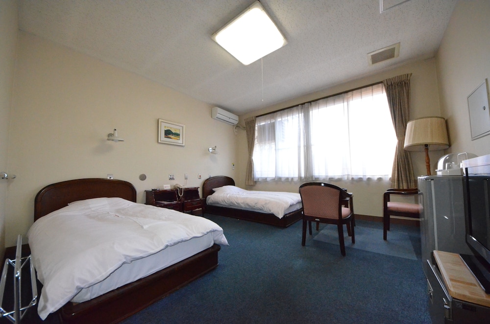 客室1 | フレンドシップハイツよしみ