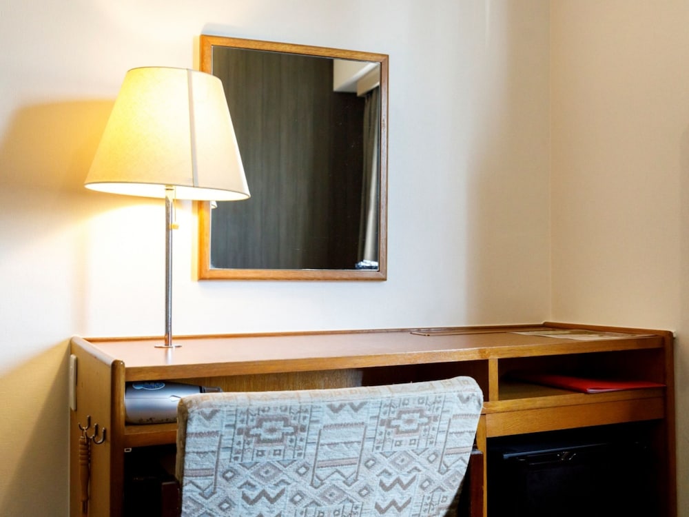 ダブルルーム 喫煙可 : タバコ ○ 客室1 | 宮崎ライオンズホテル