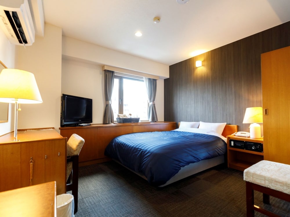 ダブルルーム 喫煙可 : タバコ ○ | 宮崎ライオンズホテル