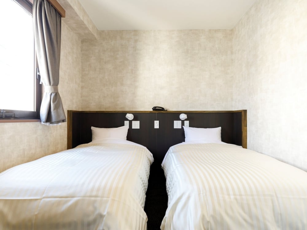 スタンダード ツインルーム 禁煙 : タバコ × 客室2 | 宮崎ライオンズホテル