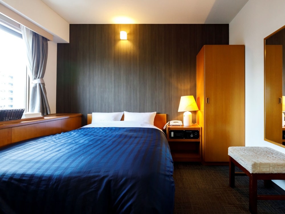 ダブルルーム 喫煙可 : タバコ ○ 客室4 | 宮崎ライオンズホテル