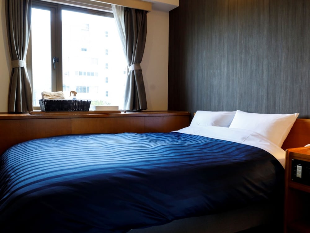 ダブルルーム 喫煙可 : タバコ ○ 客室2 | 宮崎ライオンズホテル