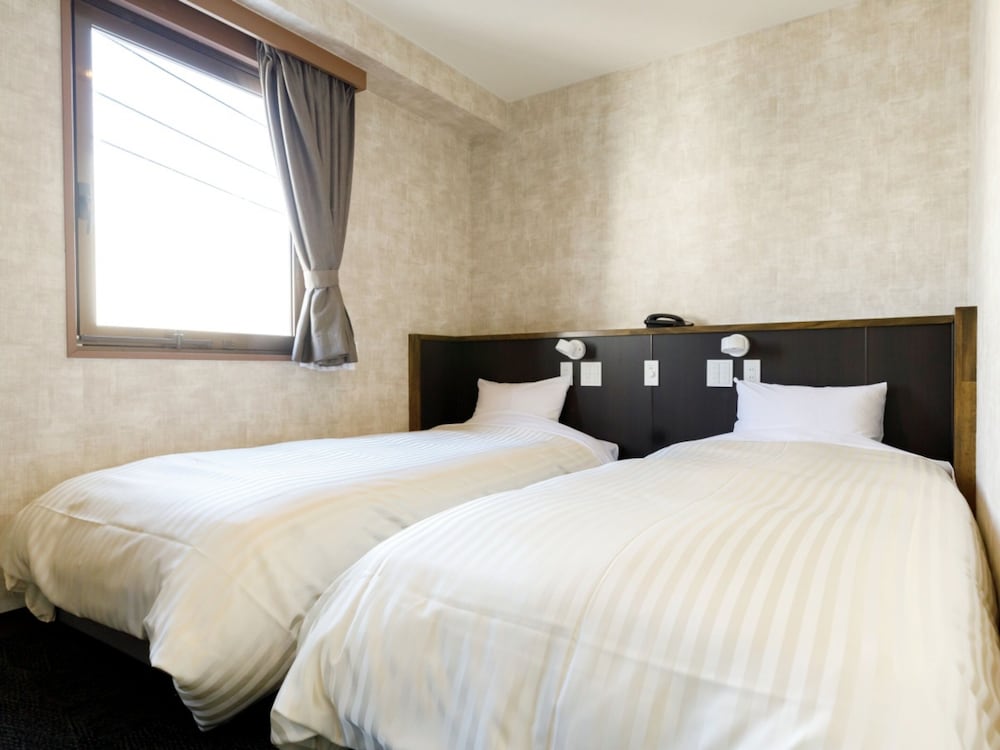 スタンダード ツインルーム 喫煙可 : タバコ ○ 客室2 | 宮崎ライオンズホテル
